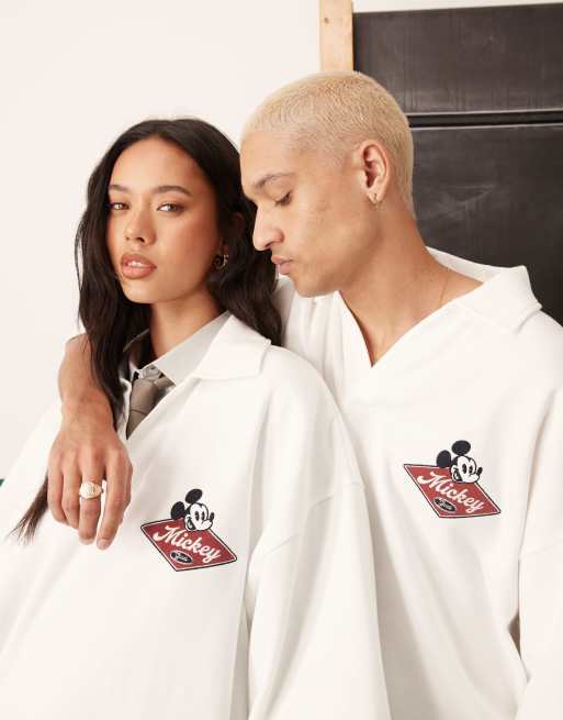 ASOS DESIGN Disney Unisex oversized polo shirt with embroidered Mickey Mouse prints in off white