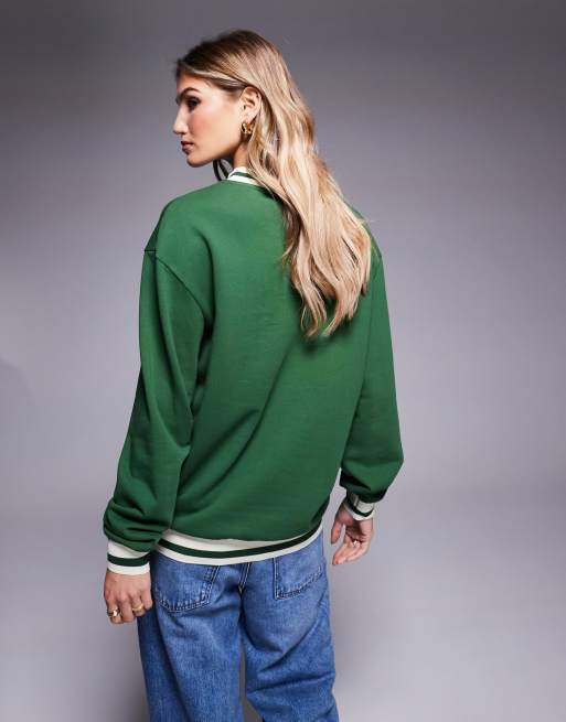 ASOS DESIGN Disney unisex oversized sweatshirt with tipping details and Mickey Mouse embroidery in green