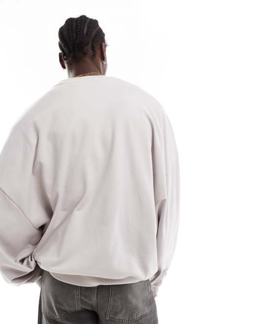 ASOS DESIGN Disney unisex super oversized sweatshirt with Mickey Mouse and Minnie Mouse print in gray