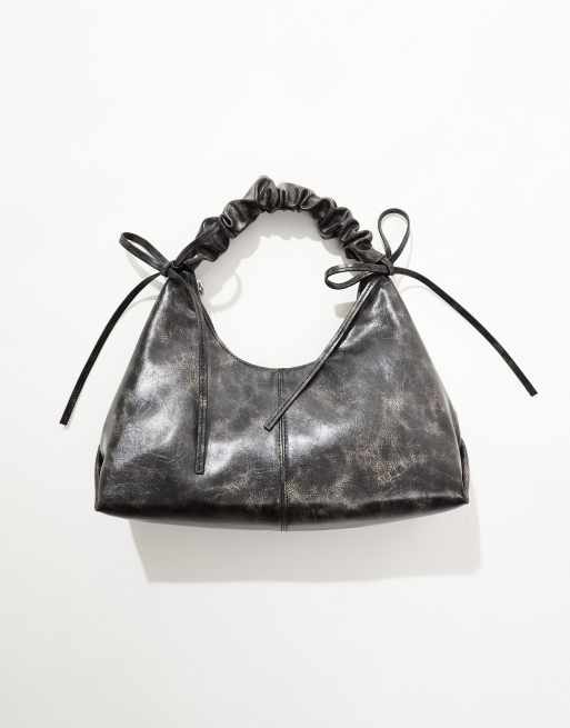 ASOS DESIGN distressed ruched handle shoulder bag with double bow detail in brown ASOS