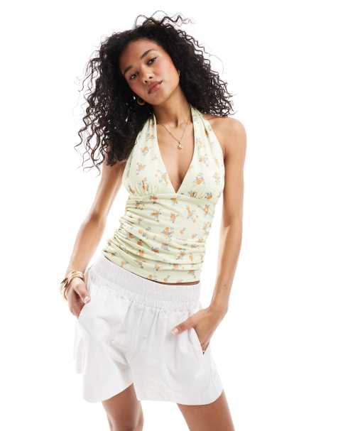ASOS DESIGN ditsy floral printed halter top in buttermilk - view 1