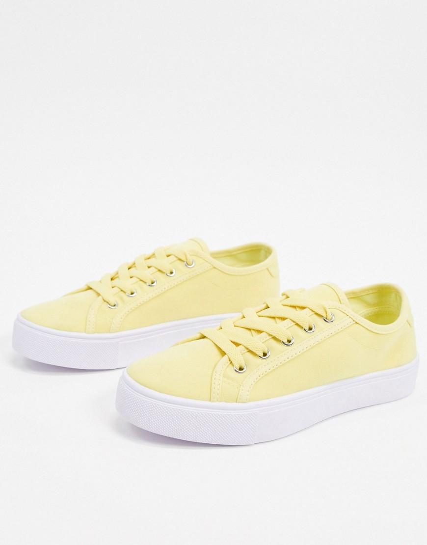 ASOS DESIGN Dizzy lace up trainers in lemon-Yellow