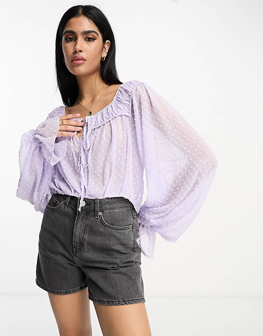 ASOS DESIGN dobby blouse with volume sleeve & tie front in lavender | ASOS