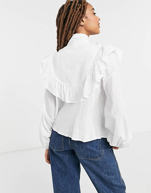 ASOS DESIGN dobby cotton pussybow blouse with ruffle detail in ivory | ASOS