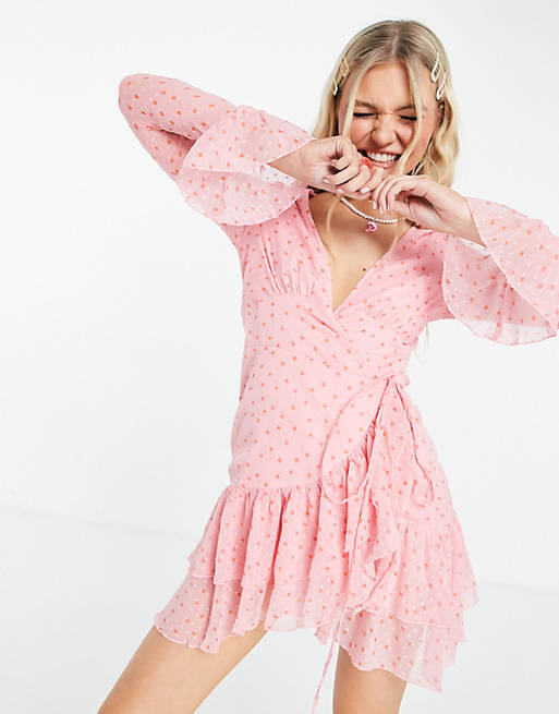 ASOS DESIGN dobby mini wrap dress with fluted sleeve in pink spot print