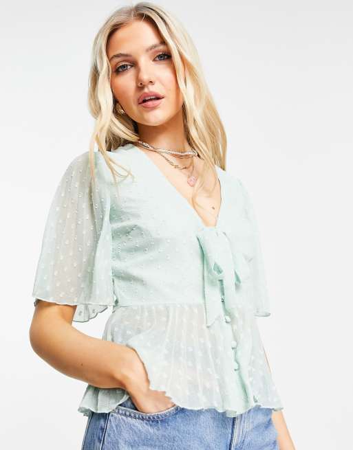 ASOS DESIGN dobby pleated peplum top with button and tie detail in sage  green