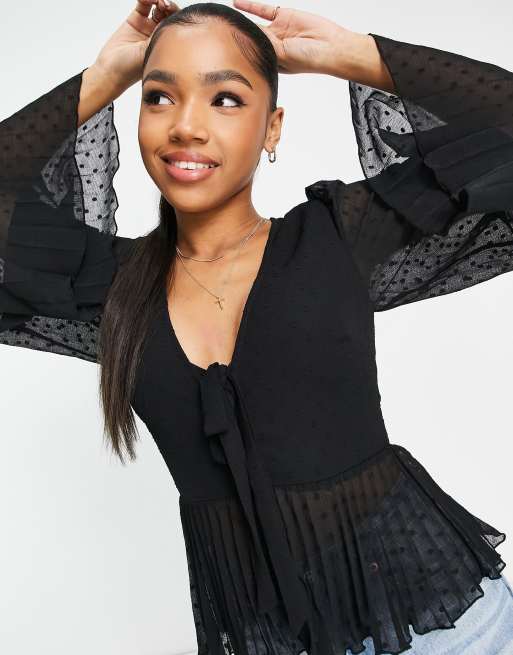 ASOS DESIGN dobby pleated peplum top with button and tie detail with long  sleeve in black