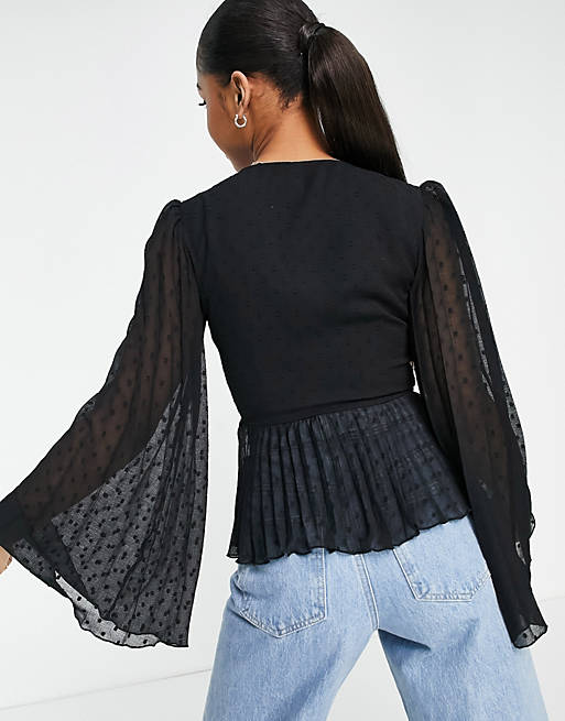 Tops Shirts & Blouses/dobby pleated peplum top with button and tie detail with long sleeve in black 