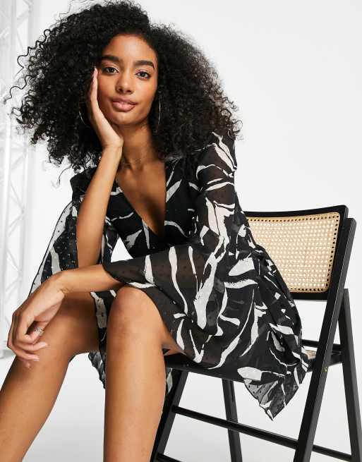 ASOS DESIGN dobby pleated wrap mini dress in mono zebra print