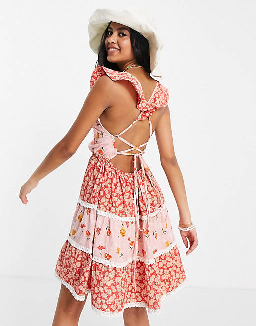 Women dobby tiered mini skater sundress with lace up back in mixed floral 