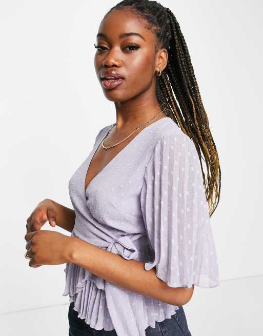 ASOS DESIGN dobby wrap short sleeve blouse with pleated peplum hem