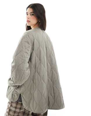 ASOS DESIGN dolphin hem collarless quilted jacket in khaki