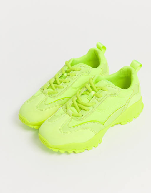 Luminous store yellow trainers