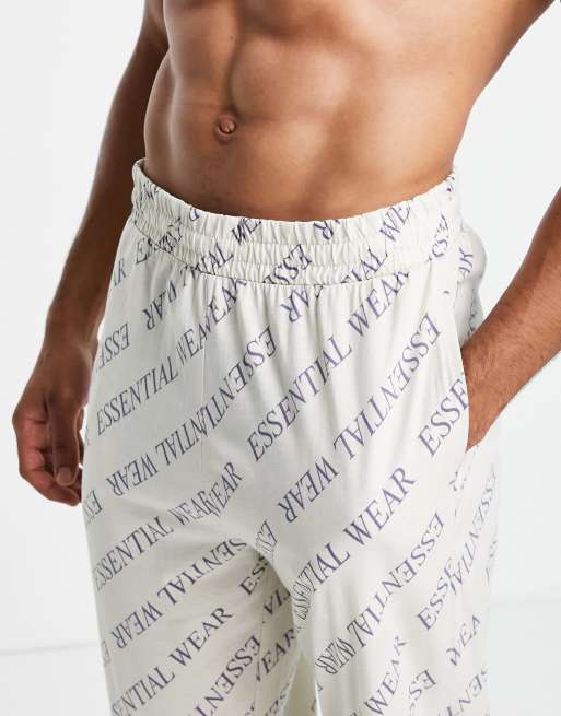 ASOS DESIGN – Domowe joggersy oversize we wzór na całej powierzchni, 4 z 4