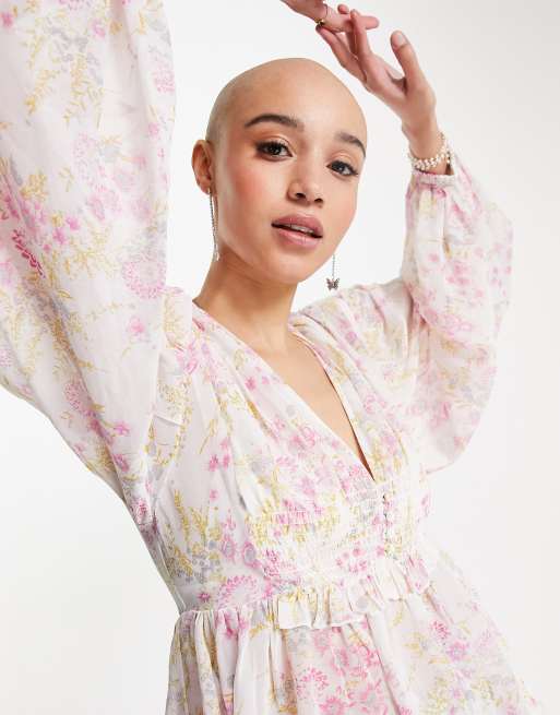 ASOS DESIGN - Doorschijnende blouse met lange mouwen en aangerimpelde taille in bloemenprint