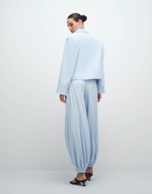 ASOS DESIGN – Dopasowane jasnoniebieskie spodnie z balonowymi nogawkami i ściągaczami, 3 z 7