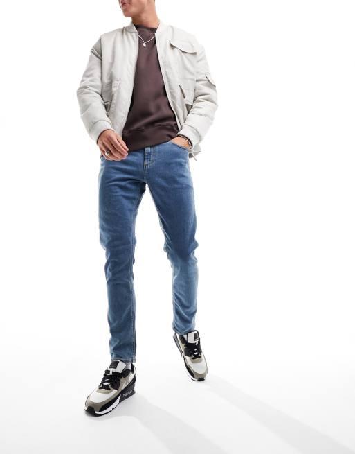 ASOS DESIGN - Dopasowane jeansy ze spranego denimu