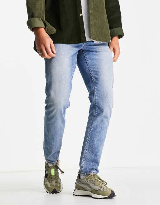 ASOS DESIGN – Dopasowane jeansy ze stretchem w kolorze spranego błękitu w stylu vintage