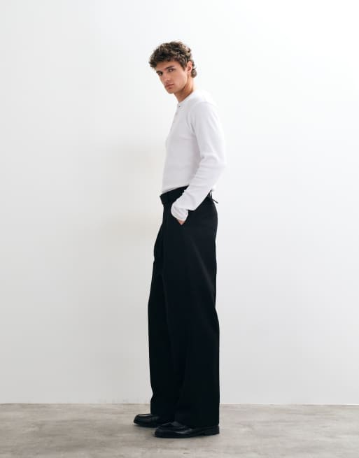 ASOS DESIGN dopasowane spodnie z szerokimi nogawkami i paskiem w kolorze czarnym, 4 z 5