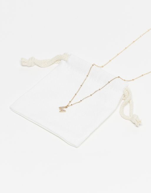 ASOS DESIGN dot-dash necklace with cubic zirconia M initial pendant in gold tone with gift bag, 2 of 3