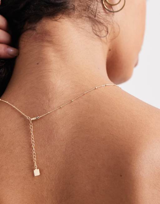ASOS DESIGN dot-dash necklace with cubic zirconia M initial pendant in gold tone with gift bag, 3 of 3