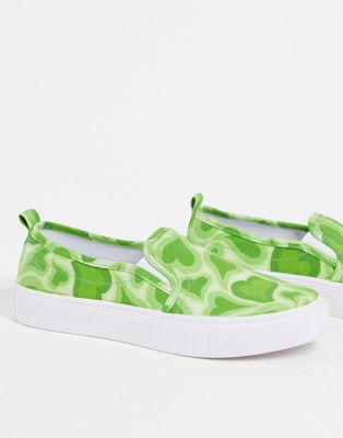 ASOS DESIGN Dotty slip-on canvas sneakers in green heart print