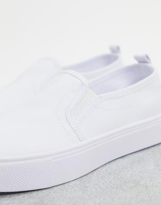 white slip on plimsolls