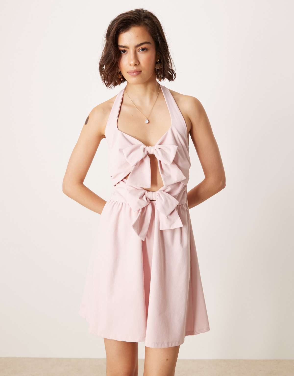 ASOS DESIGN double bow front halter mini dress in baby pink