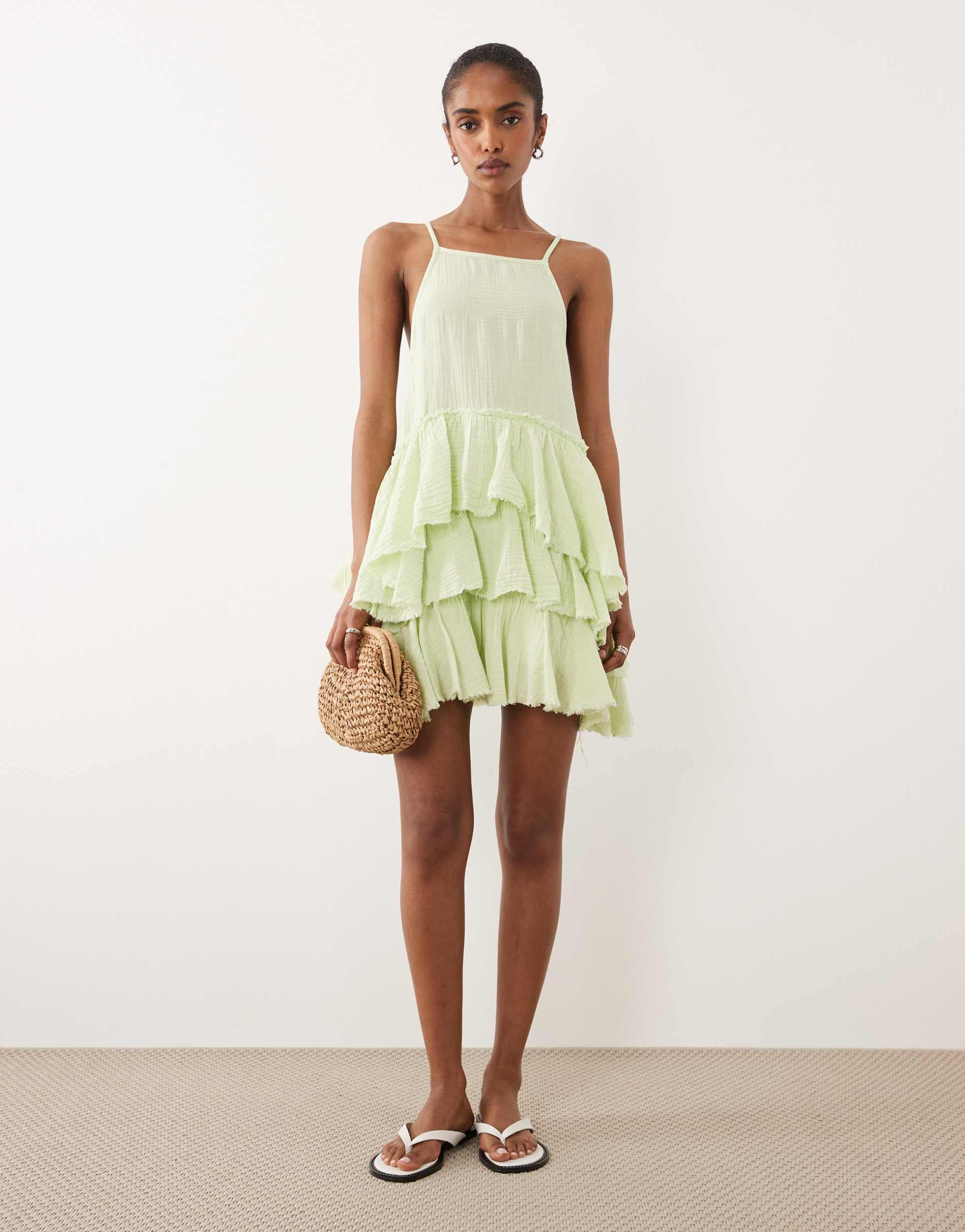 asos design double cloth washed mini sundress with distressed ruffles in washed lime
