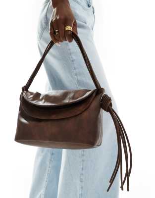 double flap washed shoulder bag with tassel in washed brown