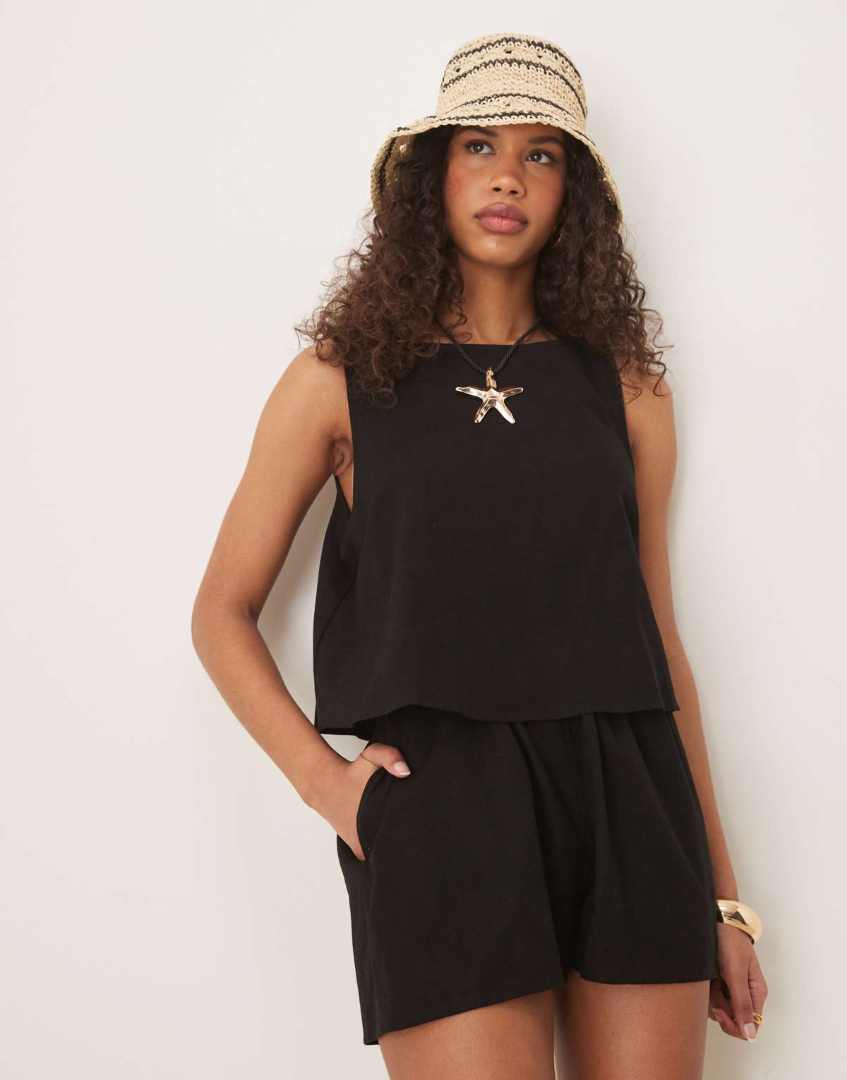 ASOS DESIGN double layer playsuit with open back in black