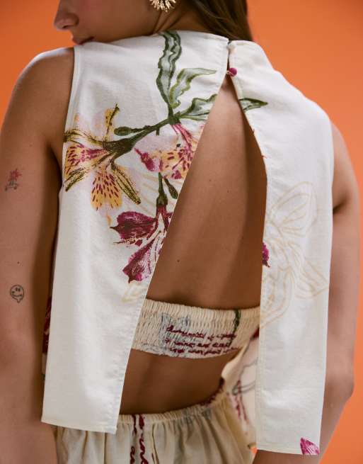 ASOS DESIGN double layer romper with open back in conversational print