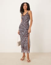 ASOS DESIGN sleeveless washed midi dress with cut out back and graphic detail 