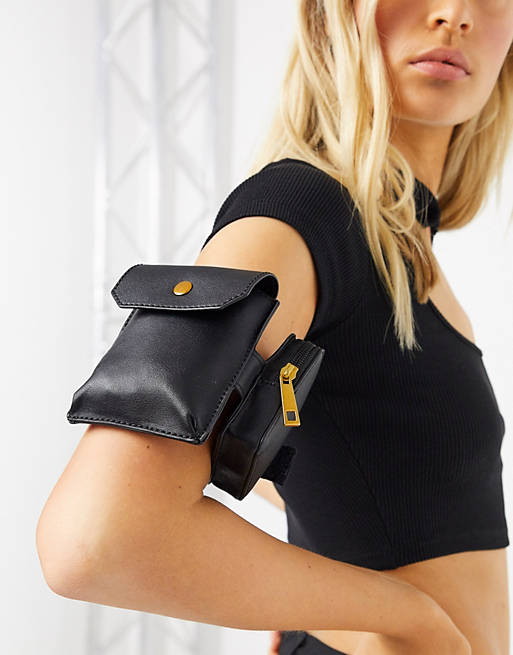 Foreigner Quagmire presume ASOS DESIGN double pouch arm bag in black with adjustable strap | ASOS