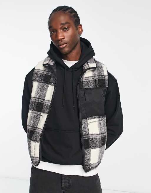 ASOS DESIGN - Doudoune sans manches en imitation peau de mouton à carreaux - Noir et blanc
