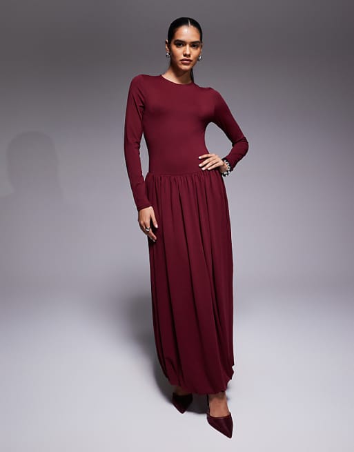 asos burgundy dress DESIGN ruffle corset detail tiered maxi with hi low hem in The ASOS DESIGN ribbed long sleeve slit front mini dress in burgundy offers a chic and stylish addition to your winter wardrobe ASOS DESIGN velvet panelled lace