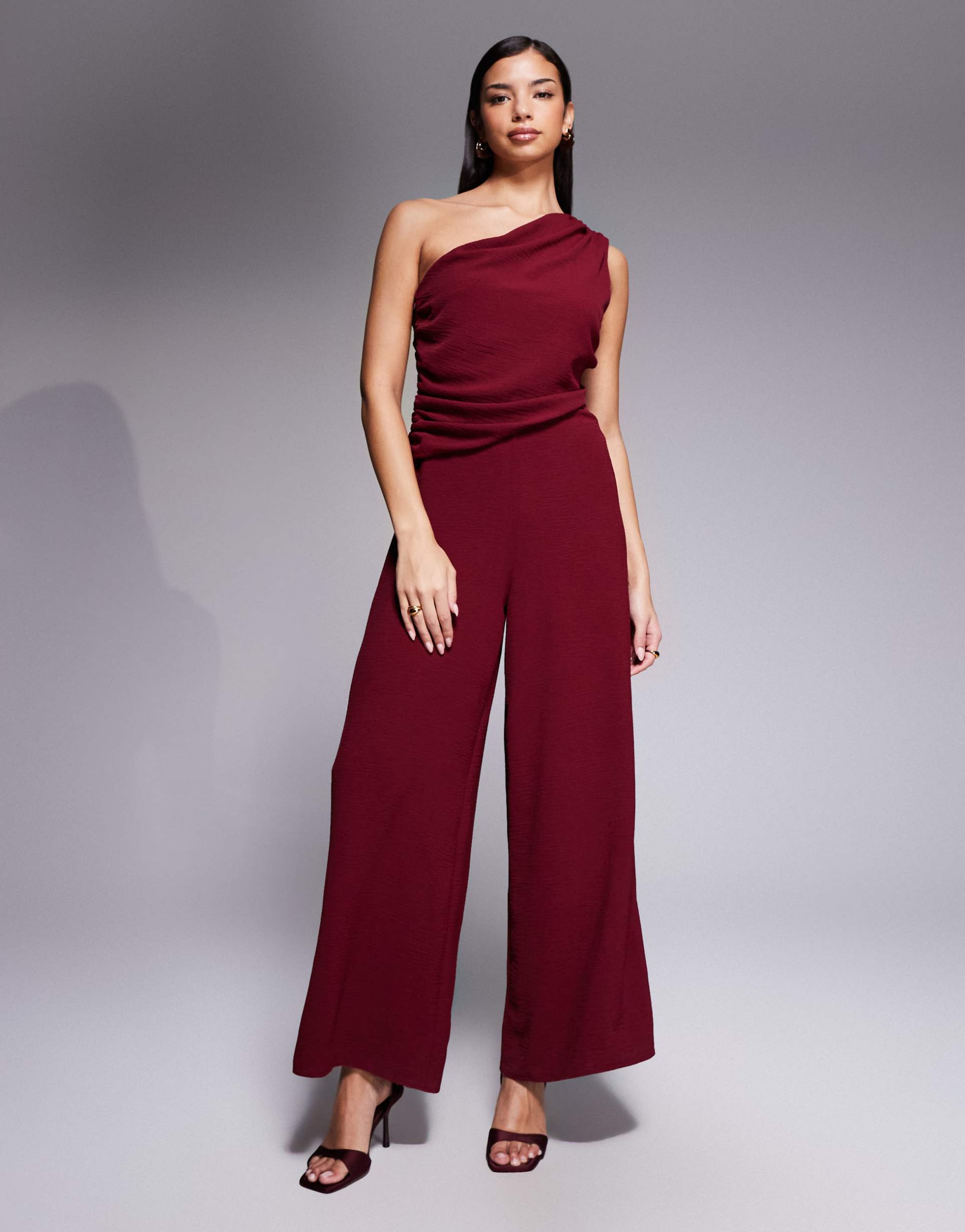 asos design draped one shoulder jumpsuit in burgundy