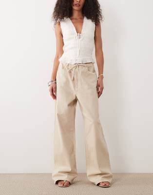 ASOS DESIGN drapey low rise jeans in dark wash