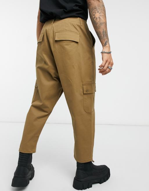 ASOS DESIGN drop crotch cargo trousers in brown with toggles