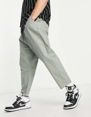 ASOS DESIGN drop crotch chinos in light green