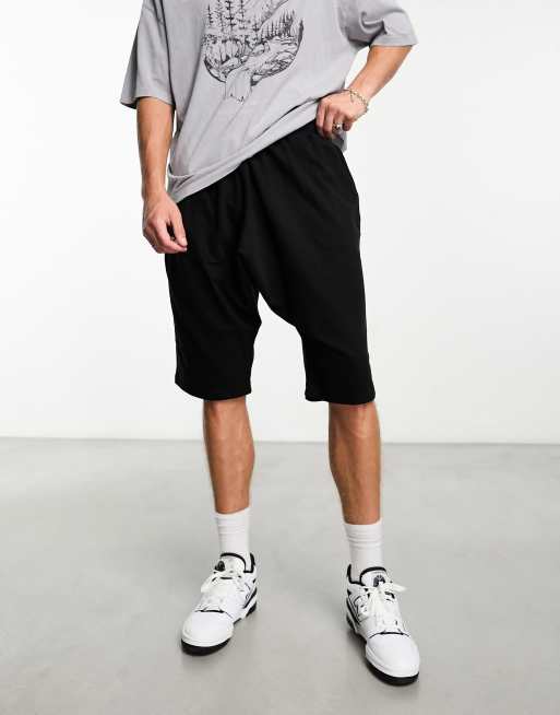 ASOS DESIGN drop crotch jersey shorts in black