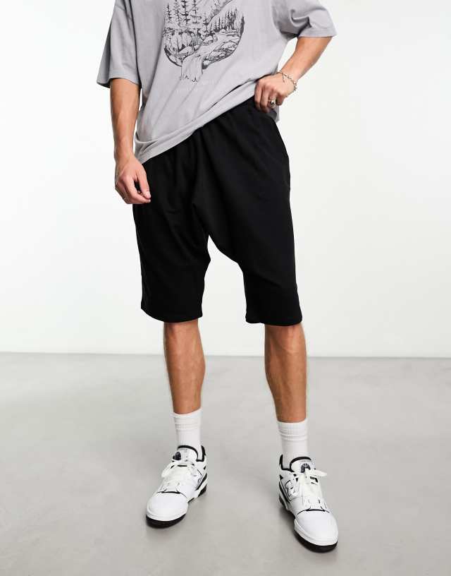 ASOS DESIGN drop crotch jersey shorts in black