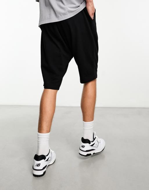 ASOS DESIGN drop crotch jersey shorts in black