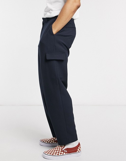 ASOS DESIGN drop crotch tapered crop smart trousers in cross hatch with cargo pocket in navy