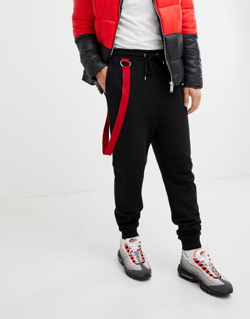 ASOS DESIGN drop crotch trackies with taping in black