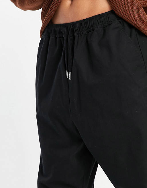 Men drop crotch trousers in black 