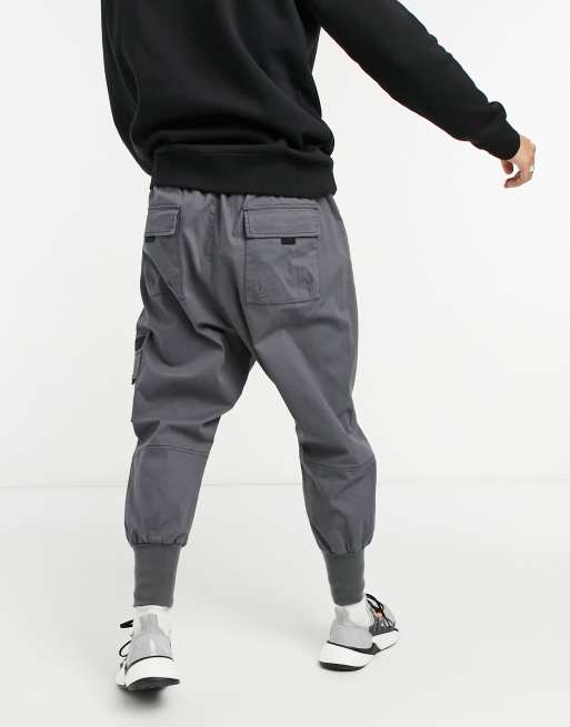 ASOS DESIGN drop crotch trousers with MA1 pocket and jersey cuff