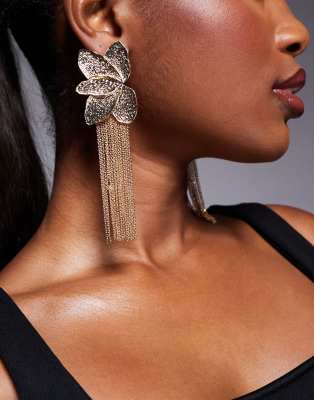 drop earrings in textured petal design with chain tassels in gold tone