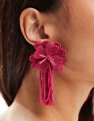 ASOS DESIGN drop earrings with beaded floral design in hot pink