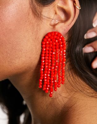 ASOS DESIGN drop earrings with beaded tassel design in orange